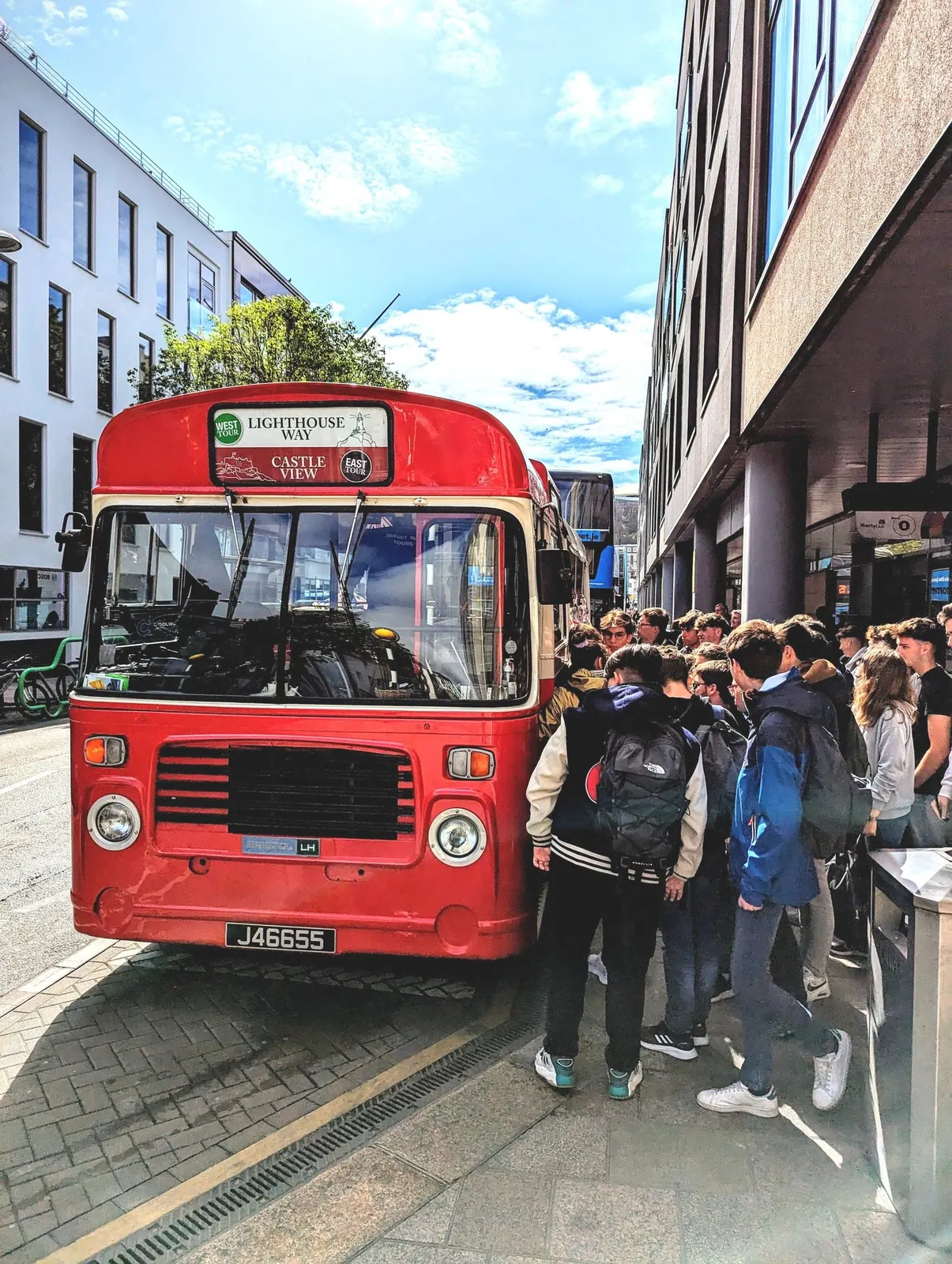 Boarding the vintage bus in St Helier