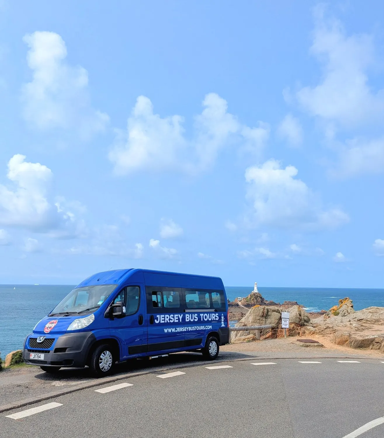 Jersey Bus Tours minibus at Corbière for airport transfers